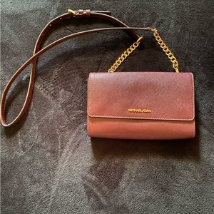 MK crossbody with detachable wristlet.